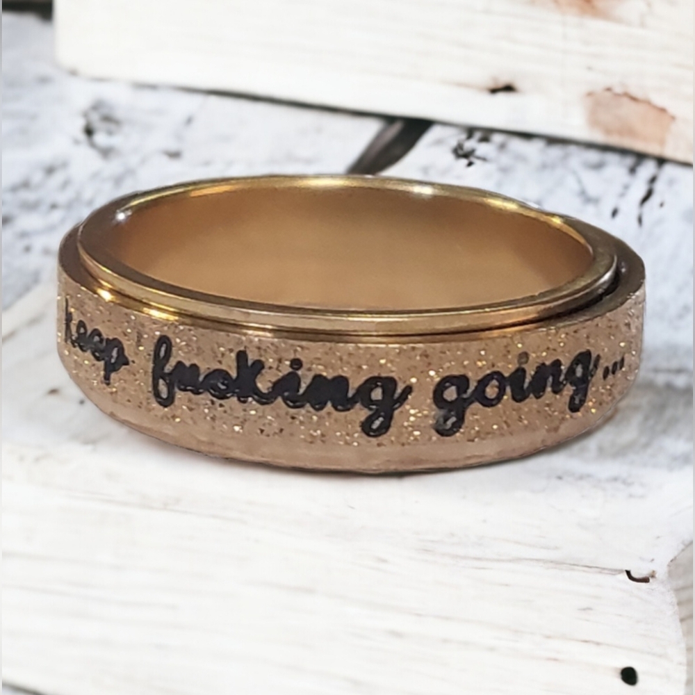 Womens "Keep going" Stainless Steel Fidget Ring